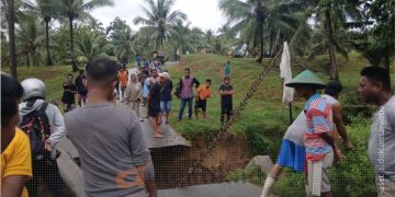 Amblas - kondisi akses jalan menuju Desa Liyoto, Kecamatan Bongomeme, Kabupaten Gorontalo, Rabu (26/6/2024).
