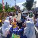 Iringi-iringan pasangan Calon Bupati dan Wakil Bupati, Saipul A. Mbuinga-Iwan S. Adam saat mendaftarkan diri ke KPU Pohuwato.