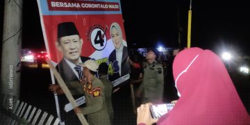 Salah satu alat peraga kampanye yang ditertibkan tim gabungan, Ahad (24/11/2024).