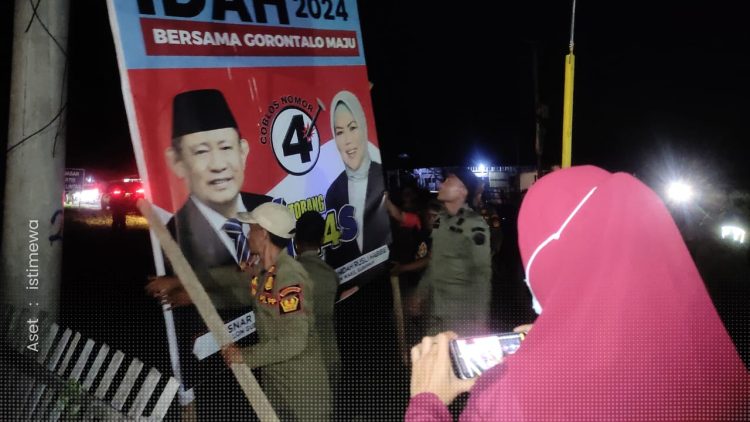 Salah satu alat peraga kampanye yang ditertibkan tim gabungan, Ahad (24/11/2024).