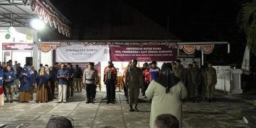 KPU Kabupaten Bone Bolango saat menggelar apel penyegelan kotak suara sekaligus pembersihan alat peraga kampanye (APK).