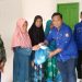 Karang Taruna Kabupaten Pohuwato bersama Rakyat Penambang saat mendistribusikan bantuan sembako kepada masyarakat, Jumat (7/2/2025).